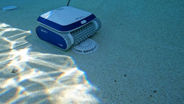Aquabot REVA pulling leaves and larger debris from the pool