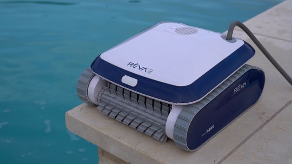 Aquabot REVA resting poolside after a cleaning cycle