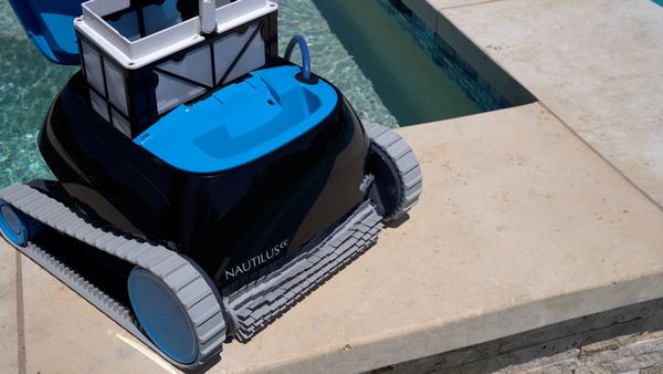 Lifting the top-load basket out of the Dolphin Nautilus CC