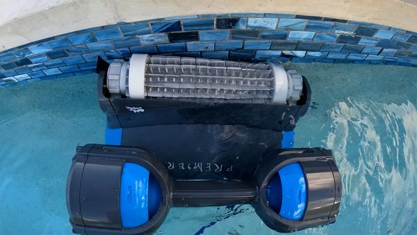 Top-down view of the Dolphin Premier cleaning near the waterline