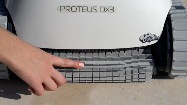 Close-up of the cleaning brush on the Dolphin Proteus DX3