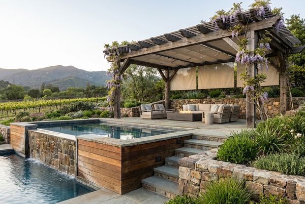 Above-ground pool with a pergola shading the deck