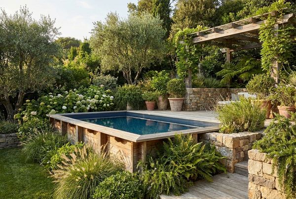 Above-ground pool styled in a compact urban courtyard