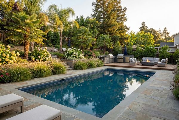 Resort-style backyard makeover with pool and covered patio