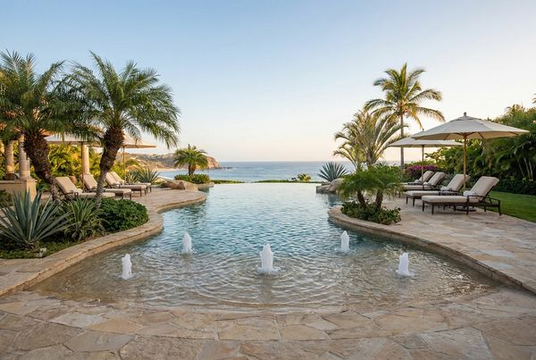 Beach entry pool with bubblers along the wide shallow shelf
