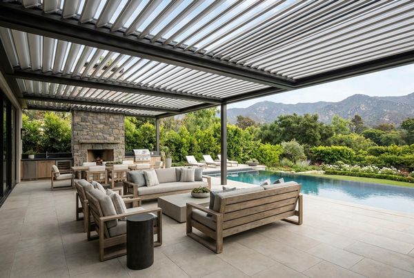 Louvered-roof covered patio with adjustable aluminum blades over a patio