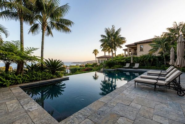 Dark blue tile pool with a shimmering waterline band