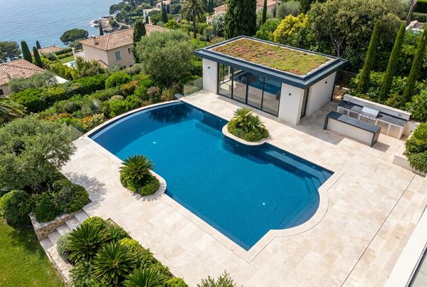 Fiberglass pool with a deep blue gelcoat finish