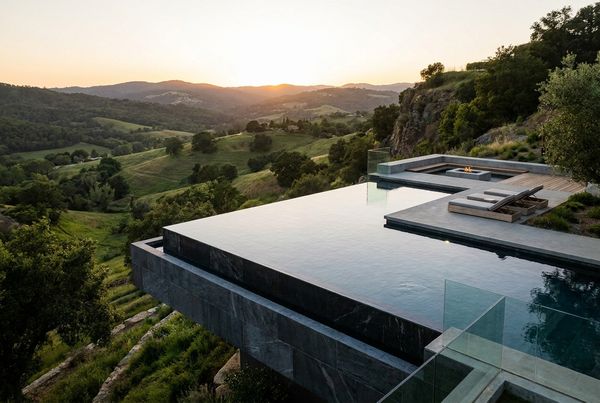 Infinity pool overlooking a green valley view