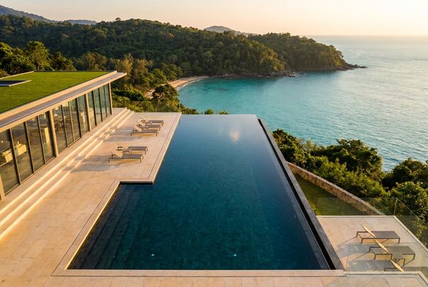 Wide infinity pool overlooking a sea horizon