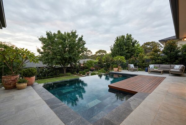 Infinity pool integrated into a contemporary deck