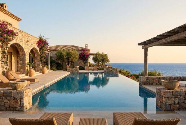 Infinity pool with a glass-walled vanishing edge