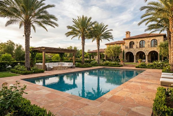 Roman-shaped Mediterranean pool with a raised spa