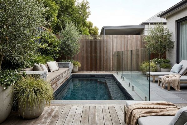 Aerial view of a modern rectangular pool and deck