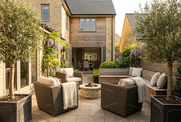 Outdoor patio furniture styled with an outdoor dining set