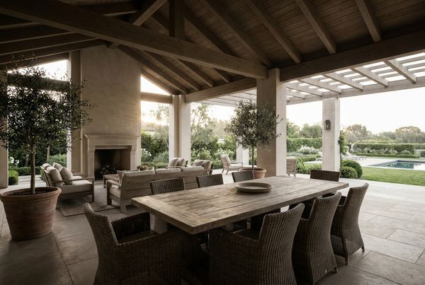 Covered patio with a full outdoor dining set for six