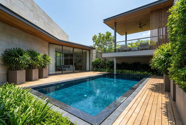 Plunge pool with a sheer-descent waterfall along one wall