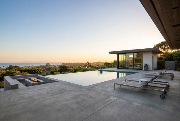 Broom-finish concrete pool deck around an inground pool