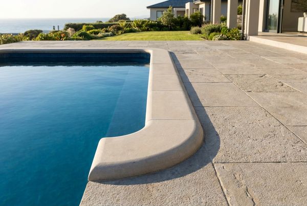 Bullnose paver coping edge detail at the pool waterline