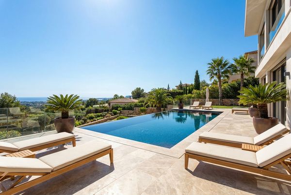 Swimming pool deck with a broom-finish concrete surround
