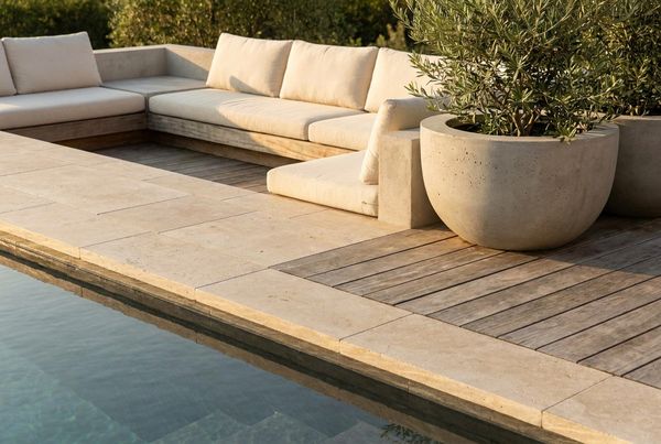Swimming pool deck with wood-look composite planks