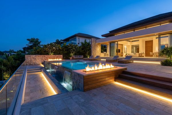 Swimming pool deck with large-format tile and minimal grout lines