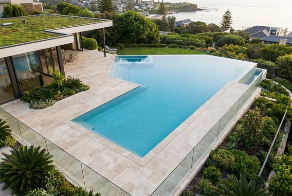 Horizontal wood-slat pool fence with warm timber tones