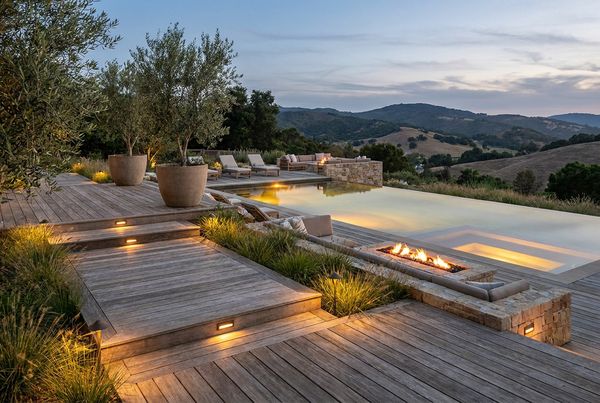 Existing swimming pool upgraded with modern LED lighting at night
