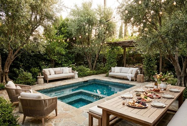 Pool filled with games, toys and floats for guests