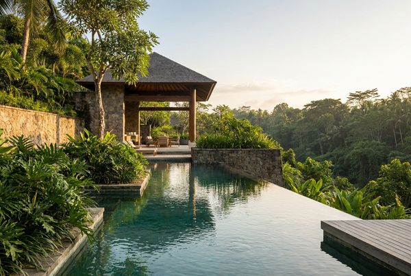 Secluded private pool enclosed by dense greenery