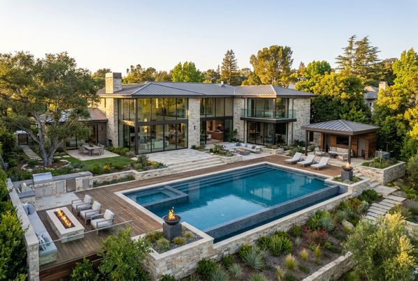 Aerial view of a fully remodeled backyard pool