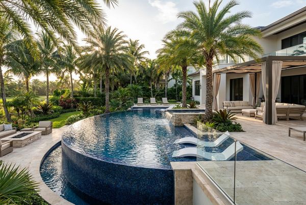 Remodeled pool with new travertine coping and deck