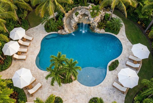 Aerial view of a rectangular pool with a perimeter overflow edge