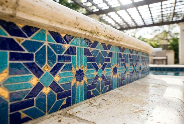 Turquoise glass mosaic waterline tile styled variant