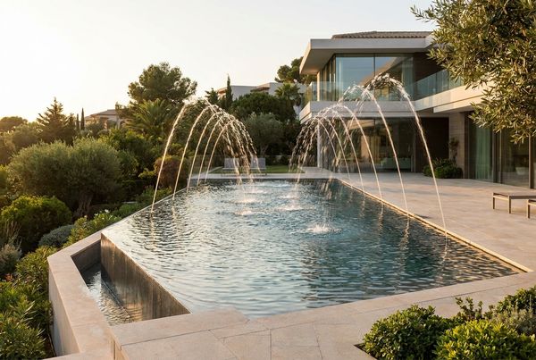 Fountain jets rising from the surface of a pool