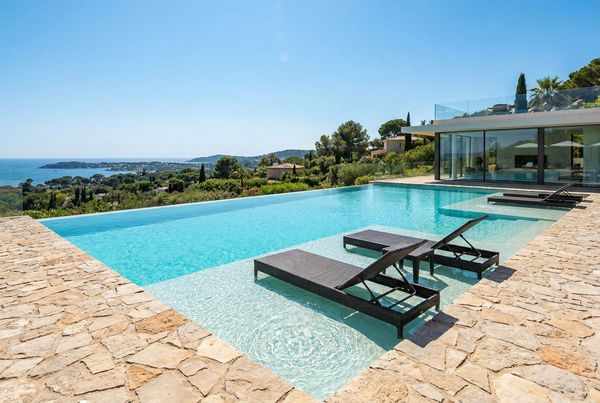 Saltwater pool with a wide tanning ledge and shallow lounging area