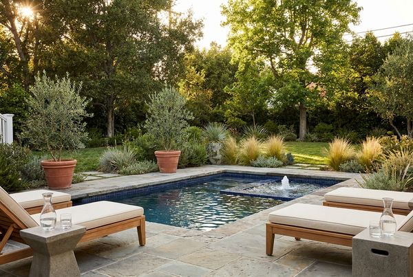 Small cocktail spool pool with integrated bench and spa jets