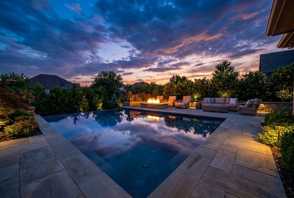 Small courtyard pool framed by white walls