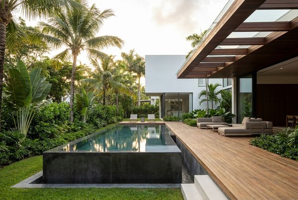 Beach-entry tropical pool with a gently sloping shallow shelf